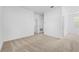 Upstairs hallway with carpet and doors to bedrooms at 340 Belmond Dr, Debary, FL 32713