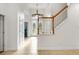 Inviting foyer with staircase, tile flooring, and a glass front door at 943 Elm Harbor Ct, Lake Mary, FL 32746