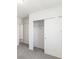 Bedroom with a spacious closet and gray carpeting at 5166 Minneola Ln, Saint Cloud, FL 34772
