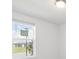 Bright bedroom with a window and neutral walls at 5166 Minneola Ln, Saint Cloud, FL 34772