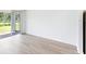Living area with sliding doors leading to patio at 5166 Minneola Ln, Saint Cloud, FL 34772