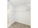 Spacious walk-in closet with wire shelving at 5166 Minneola Ln, Saint Cloud, FL 34772