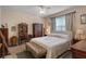Charming main bedroom with a cozy sitting area, classic furniture, and soft lighting, creating a relaxing retreat at 5307 Cortland Dr, Davenport, FL 33837