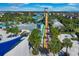 Vibrant aerial view of a resort waterpark, showcasing slides, pools, and lush landscaping at 7763 Westland Dr, Kissimmee, FL 34747