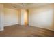 Large bedroom features neutral carpet and paint at 13910 Dove Wing Ct, Orlando, FL 32828