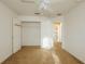 Comfortable bedroom with open closet and plenty of natural light at 13910 Dove Wing Ct, Orlando, FL 32828