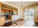Eat-in kitchen with stainless steel appliances and sliding glass door to patio at 13910 Dove Wing Ct, Orlando, FL 32828