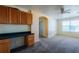 Comfortable loft with built-in desk and view of nearby windows and rooms at 13910 Dove Wing Ct, Orlando, FL 32828
