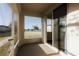 Relaxing screened patio with a view of the lake and lush greenery at 13910 Dove Wing Ct, Orlando, FL 32828