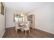 Bright dining room with chandelier and hardwood floors at 14331 Bending Branch Ct, Orlando, FL 32824