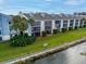 Aerial view of condo building near the water at 4109 Fairview Vista Pt # 219, Orlando, FL 32804