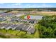 Aerial view showing the home's location in a neighborhood near a pond, with easy access to community amenities at 11218 Pixie Mandarin Ct, Winter Garden, FL 34787