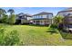 Spacious backyard with lush green grass, perfect for outdoor activities and relaxation at 11218 Pixie Mandarin Ct, Winter Garden, FL 34787