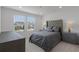 Charming bedroom with a plush queen-sized bed, soft carpet, and bright natural light at 11218 Pixie Mandarin Ct, Winter Garden, FL 34787