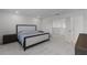 Bright bedroom features a well-lit view of the walk-in closet, and comfortable gray carpeting at 11218 Pixie Mandarin Ct, Winter Garden, FL 34787
