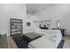 Bright, open living room featuring soaring ceilings, modern decor, and seamless flow to kitchen at 11218 Pixie Mandarin Ct, Winter Garden, FL 34787