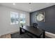 Office space featuring a modern desk, ample natural light, and sophisticated decor at 11218 Pixie Mandarin Ct, Winter Garden, FL 34787