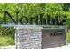 View of the stone and wood community sign for Northlake at Ovation at 11218 Pixie Mandarin Ct, Winter Garden, FL 34787