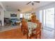 Casual dining area with a table and chairs, opening to the living room at 315 Aldridge Ln, Davenport, FL 33897