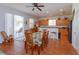 Well-equipped kitchen with wood cabinets, tiled flooring, and a breakfast bar at 315 Aldridge Ln, Davenport, FL 33897