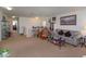 Spacious living room featuring a comfy couch and ample natural light at 315 Aldridge Ln, Davenport, FL 33897