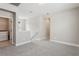 A bonus room featuring neutral walls and carpeted floors with access to laundry room and bedrooms at 5015 Railroad Vine Aly, Winter Garden, FL 34787