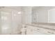 Bright bathroom features a glass-enclosed shower, granite vanity, and modern fixtures, creating a spa-like atmosphere at 3303 Kayak Way, Orlando, FL 32820