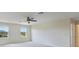 Bedroom with carpet, natural light, and fan providing a comfortable atmosphere at 3303 Kayak Way, Orlando, FL 32820