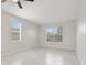 Bright bedroom with tile flooring and windows offering natural light at 3303 Kayak Way, Orlando, FL 32820