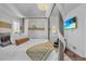 Main bedroom featuring a four poster bed and a wall-mounted TV at 733 Clifford Dr, Orlando, FL 32804