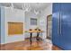 Small dining area with built-in bench seating and a wooden table at 733 Clifford Dr, Orlando, FL 32804