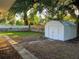 Backyard view, featuring a metal storage shed at 924 Beard Ave, Winter Park, FL 32789