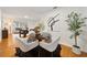 Charming dining area with a round table, four chairs, and a cowhide rug at 924 Beard Ave, Winter Park, FL 32789