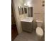 Updated bathroom with new vanity, toilet and flooring at 13103 Mulberry Park Dr # 817, Orlando, FL 32821