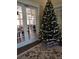 Community clubhouse with Christmas tree and seating area at 13103 Mulberry Park Dr # 817, Orlando, FL 32821