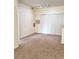 Bright and spacious living room with neutral carpeting and ample storage space at 13103 Mulberry Park Dr # 817, Orlando, FL 32821
