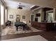 Beautiful recreation room with a pool table and full service bar at 13103 Mulberry Park Dr # 817, Orlando, FL 32821