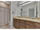 Bathroom with shower/tub combo and double vanity at 1460 3Rd Ave, Deland, FL 32724