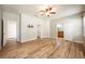 Spacious bedroom with hardwood floors and access to bathroom at 1601 Blue Grass Blvd, Deland, FL 32724