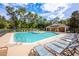 Relaxing community pool with ample lounge chairs at 1601 Blue Grass Blvd, Deland, FL 32724