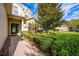 Two story home with manicured landscaping at 1601 Blue Grass Blvd, Deland, FL 32724