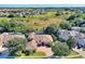 Beautiful single Gathering home with a brick driveway, mature trees, and screened in pool in a quiet neighborhood at 1869 Merlot Dr, Sanford, FL 32771