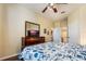 Comfortable main bedroom with large dresser and a view of the ensuite at 2785 Almaton Loop # 305, Kissimmee, FL 34747