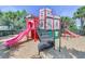 Castle-themed playground with slides, stairs, and climbing features, offering a fun recreational space for  at 2785 Almaton Loop # 305, Kissimmee, FL 34747