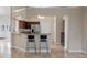 Open kitchen with breakfast bar, stainless steel appliances, and granite countertops at 2801 Ripton Ct, Orlando, FL 32835