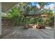 Spacious outdoor deck featuring a pergola with built-in seating, perfect for entertaining guests at 2801 Ripton Ct, Orlando, FL 32835