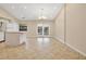 Dining area with tile floors and access to backyard at 3629 Peaceful Pl, Orlando, FL 32810