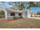 House exterior with stone accents and landscaping at 3629 Peaceful Pl, Orlando, FL 32810