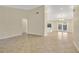 Open concept living area with views to kitchen and dining areas at 3629 Peaceful Pl, Orlando, FL 32810