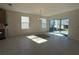 Bright dining room with sliding glass doors leading to the backyard at 6635 Tempo Way, Mascotte, FL 34753